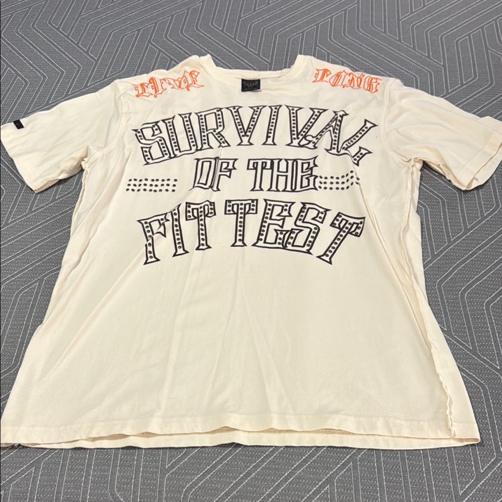 Vintage Blac LabelCream Graphic T-Shirt with Black and Orange Print